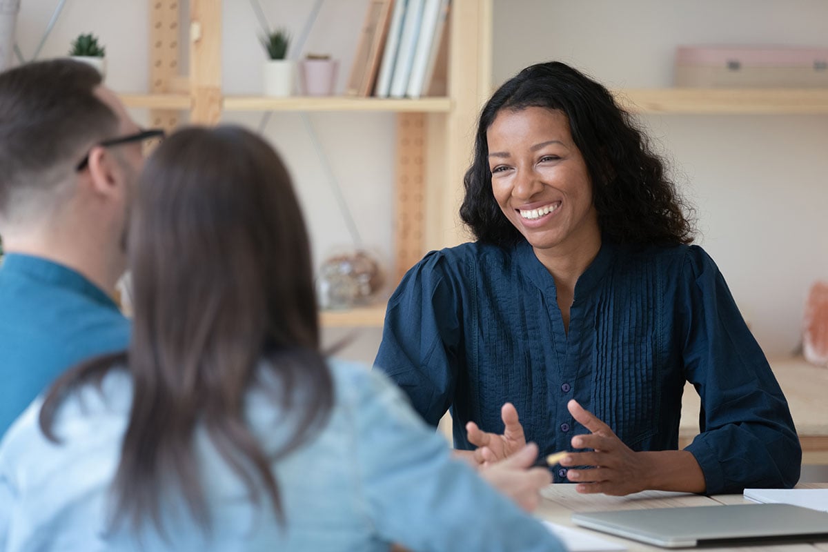 Advisor in conversation with clients