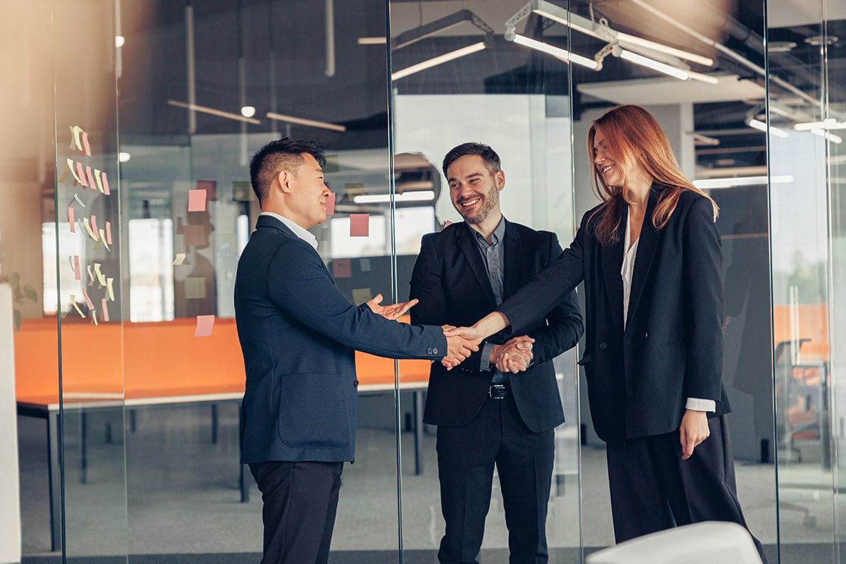 Business partners shaking hands